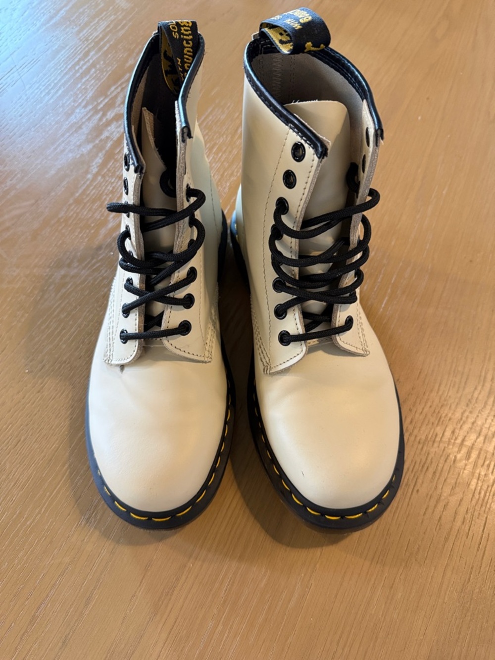 Dr. Martens Cream Leather Lace-Up Boots with Black Trim and Yellow Stitching
